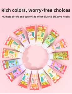 Flat lay of colorful 50ml fake cream glue tubes for DIY crafts on pink background