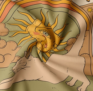 Detailed fabric texture of bohemian sun and cat tapestry with soft vintage pleats