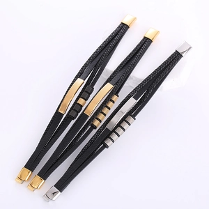 Men's multi-layer braided leather bracelets with metallic accents and magnetic clasp