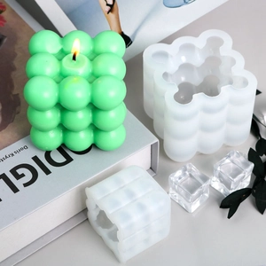 3D bubble cube silicone mold for DIY candles and soaps with finished green candle