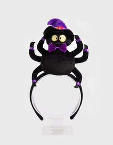 Detail of Halloween spider headband with purple wizard hat and soft plush material