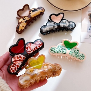 Retro acetate heart-shaped hair claw clips set with assorted tortoiseshell and marble patterns