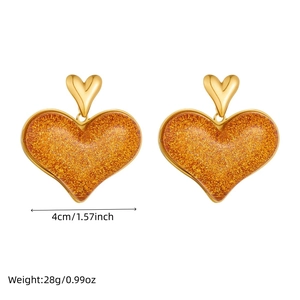 Gold plated stainless steel hoop earrings with large brown glitter heart pendants