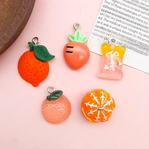 Set of resin orange pendants including carrot and fruit slices for DIY jewelry making