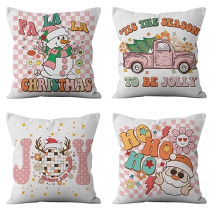 Set of four retro Christmas pillow covers with pink snowy truck and snowman patterns