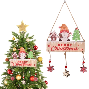 Detail of wooden Christmas tree ornament with gnome motifs and snowflake bead pendants