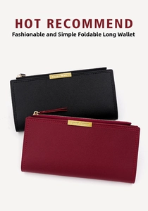 Détail de portefeuilles longs en cuir grainé noir et bordeaux avec zip doré