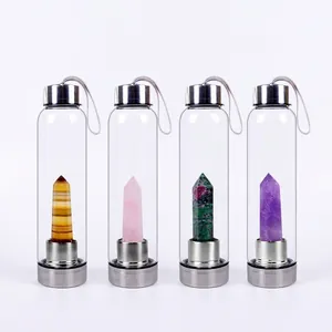Glass water bottles with natural amethyst, rose quartz, tiger eye, and ruby zoisite crystals