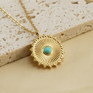 18k gold plated stainless steel sunburst pendant necklace with turquoise stone center
