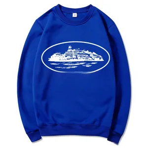Detail of navy blue crewneck sweatshirt with white graphic and inner size label M