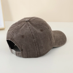 Rear view of washed dark brown kids baseball cap with adjustable metal buckle closure