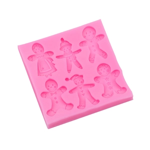 Pink silicone mold featuring six gingerbread man shapes for baking and DIY crafts