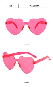 Detailed macro view of magenta heart-shaped rimless sunglasses in high-quality plastic