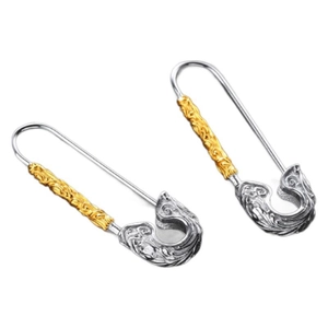 Vintage safety pin earrings with engraved floral patterns in silver and gold tone