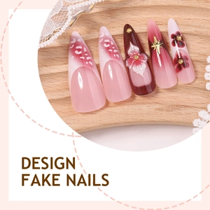 French stiletto press-on nails with 3D white flowers, leopard print and gold charms