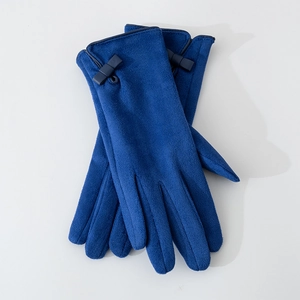 Women's royal blue suede winter gloves with elegant bow detail on white background