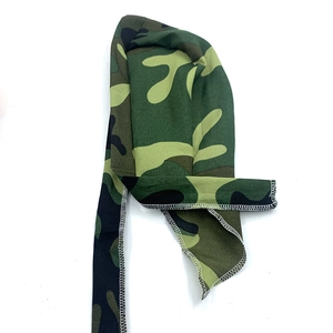 Detailed view of camouflage cycling bandana with reinforced white stitching and long straps