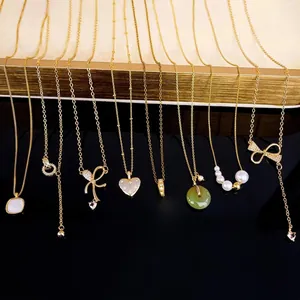 Collier Pendentif Nœud Cœur Zircon Pour Femmes Cuivre Plaqué Or Bijoux De Mode Chaîne De Clavicule Élégante