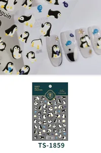 Detail of 3D embossed penguin nail stickers with blue fish motifs and model TS-1859