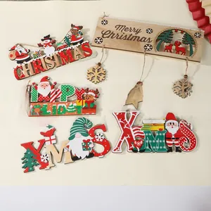 Set of assorted Christmas wooden hanging ornaments with Merry Christmas typography and jute ropes