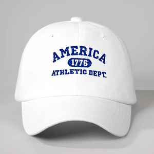 Detail of high-density navy embroidery on vintage white cotton baseball cap surface