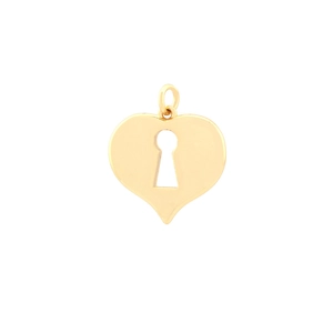 Macro detail of gold-plated heart pendant with keyhole cutout and polished metallic finish