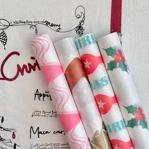Rouleaux de papier de soie de Noël festifs avec motifs de pain d'épice et de houx
