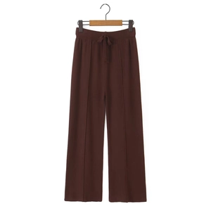 Women's dark brown knit wide-leg trousers with elastic drawstring waist and ribbed texture