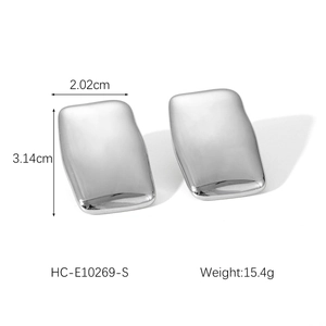 Detailed view of irregular geometric silver stud earrings with 2.02x3.14cm dimensions