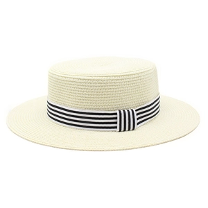 Detail of flat top straw hat with textured weave and striped grosgrain ribbon trim