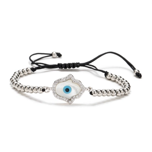 Silver Hamsa Hand bracelet with blue Evil Eye charm on adjustable black braided rope