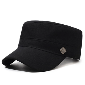 Black cotton flat top cadet cap with a square metal 'Fu' charm on a white background