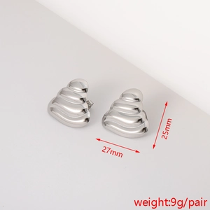 Detailed view of silver textured heart earrings with 27mm and 25mm dimensions and weight
