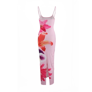 Detailed back view of a pink floral maxi dress featuring a rear slit and vibrant print