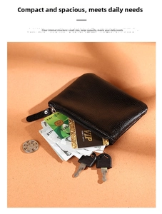 Internal view of compact black lychee pattern leather wallet holding cards and coins