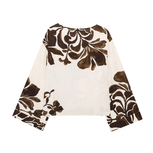 White linen long sleeve top with brown floral print and drop shoulder design