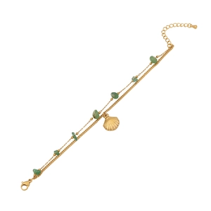 Double-layered gold bracelet with green stones and a conch shell pendant on white background