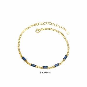 Macro detail of gold S925 sterling silver bracelet with 6.5mm blue rectangular gemstones