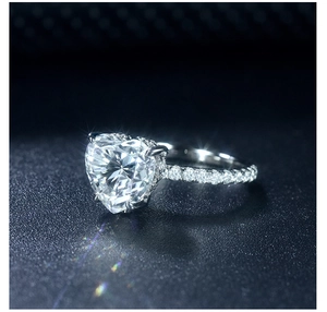 Macro shot of 925 silver ring featuring a 3.5 carat heart-shaped moissanite stone