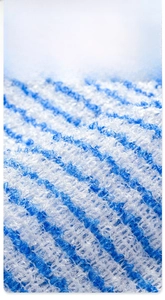 Macro shot of thick blue and white antibacterial plush fabric for bath scrubber