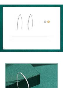 Macro detail of S925 sterling silver minimalist drop earrings with 34.5mm height dimension