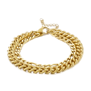 Elegant gold-tone layered curb chain bracelet for women featuring an adjustable lobster clasp