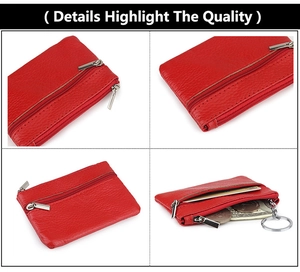 Detail of red genuine leather coin purse showing zipper compartments and keychain