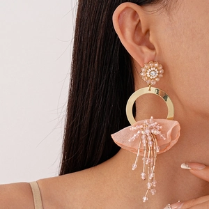 Lace flower hoop earrings with pink tassels and diamonds for a sweet vacation style