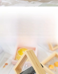Detail of a yellow PE film jewelry box showing high elasticity and push opening