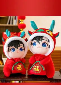 Close-up of Year of the Dragon mascot plush dolls wearing red dragon hoodies and lucky bags