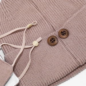 Mauve knit winter hat for men featuring rib texture, wooden buttons, and adjustable cords