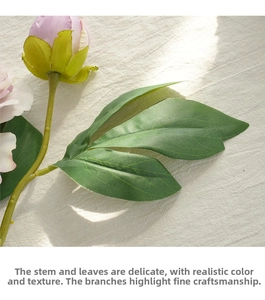 Detailed view of silk peony bud with realistic petal texture and green stem details