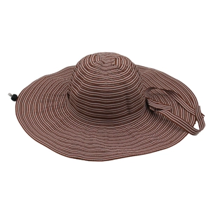 Detail of striped sun hat with adjustable drawstring and wide brim for sun protection