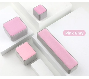 Pink and grey velvet jewelry boxes in square and rectangular shapes for rings and necklaces